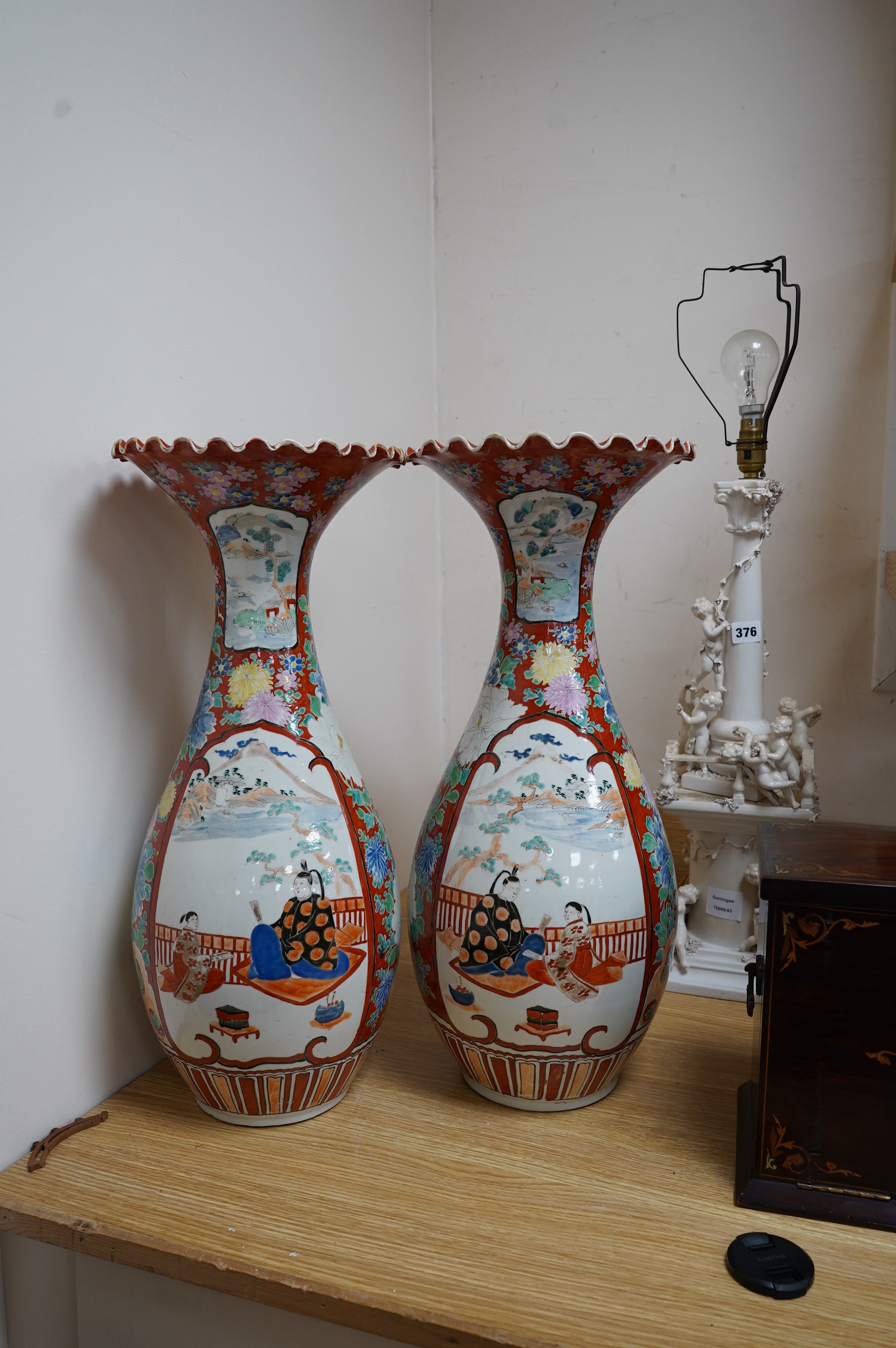 A pair of Japanese Kutani vases, Meiji period, 55.5cm. Condition - poor